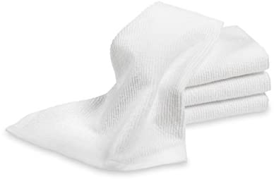 a black and white photo of a white shoe