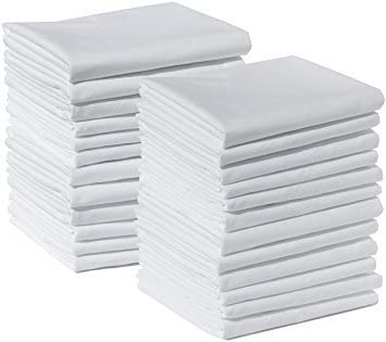 a black and white photo of a stack of books