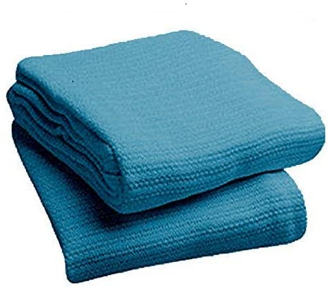 a blue suitcase sitting on top of a chair