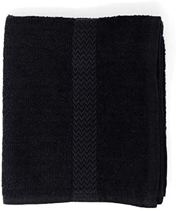 a black piece of luggage sitting on top of a table
