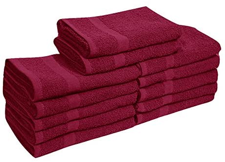 a red couch with a red blanket on top of it