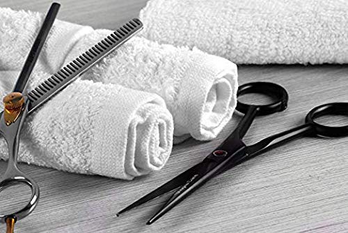 a pair of scissors sitting on top of a table