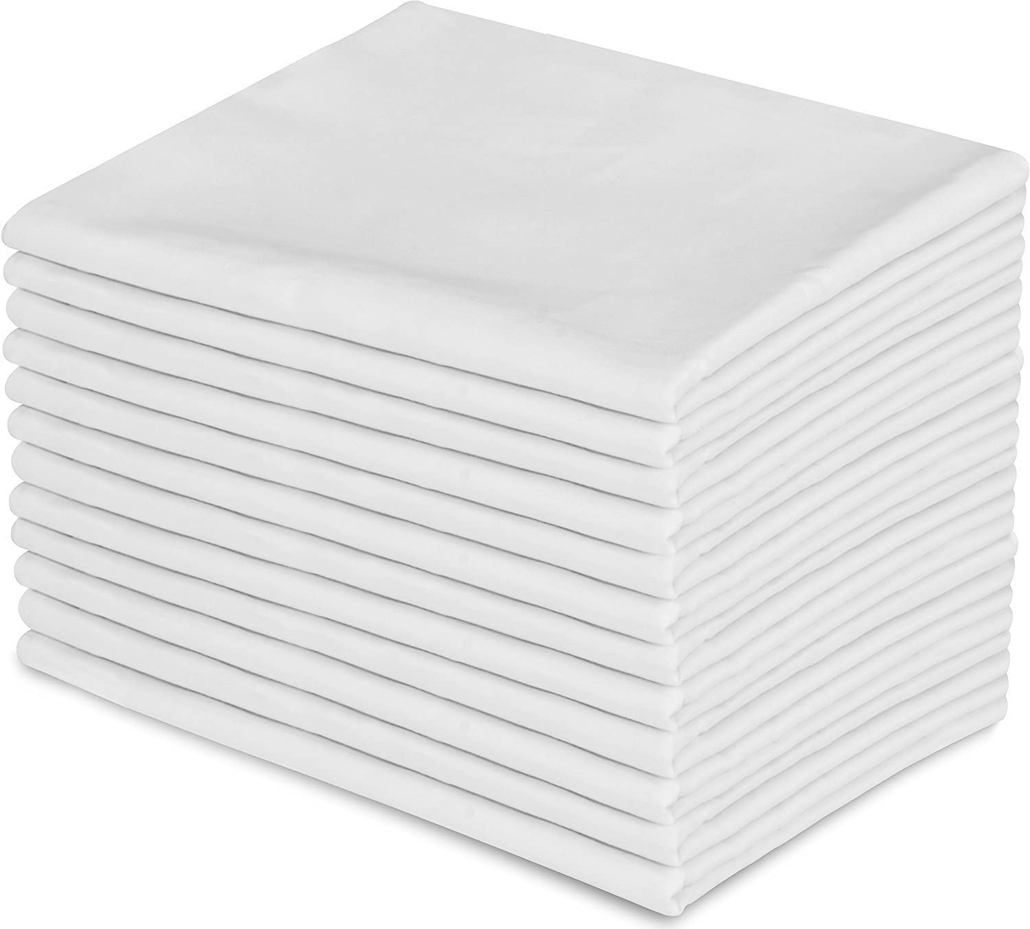 a close up of a white bed with a white background
